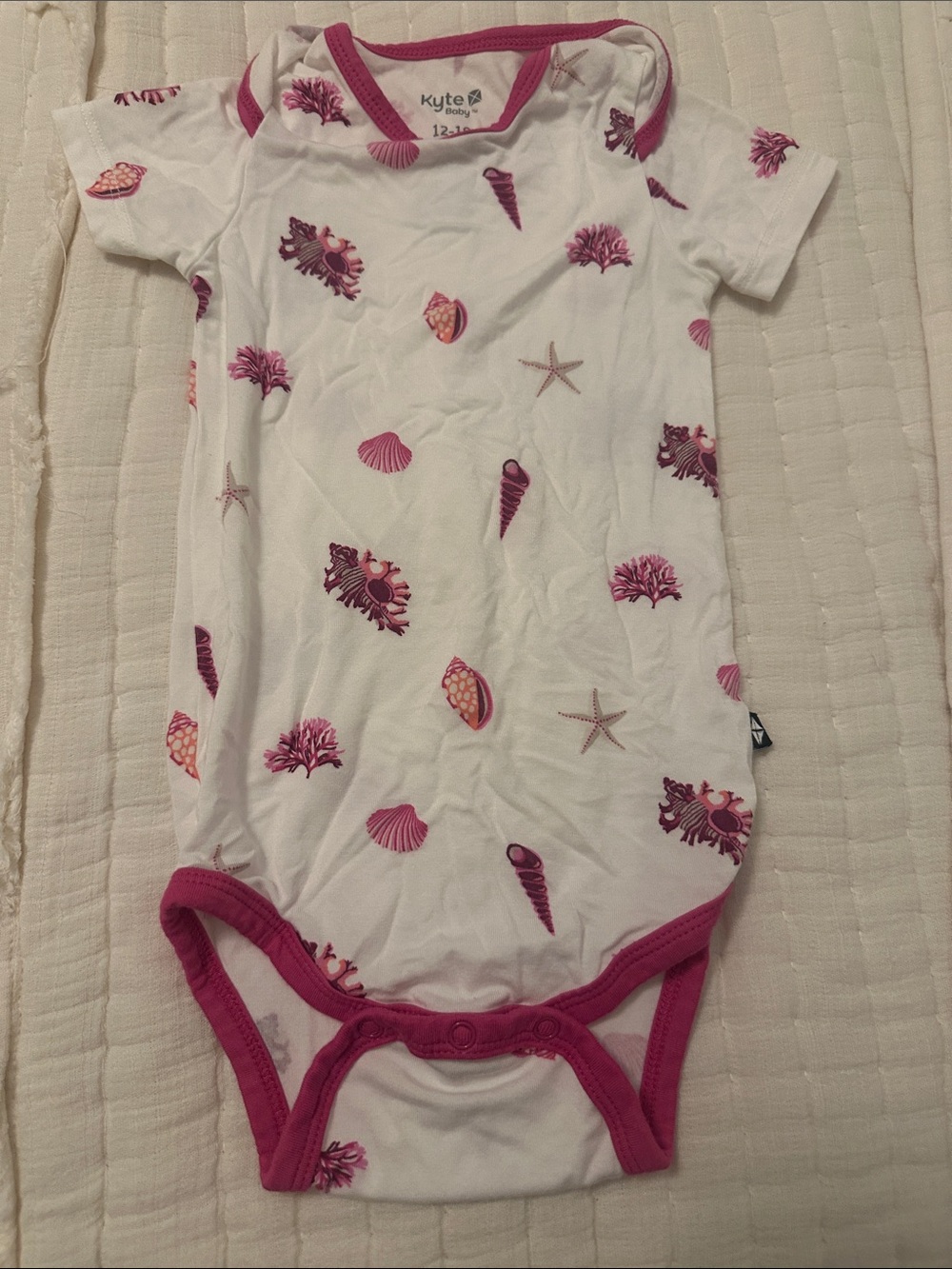 Kyte BABY White One-Piece Bodysuit with Pink Shell & Sea Print